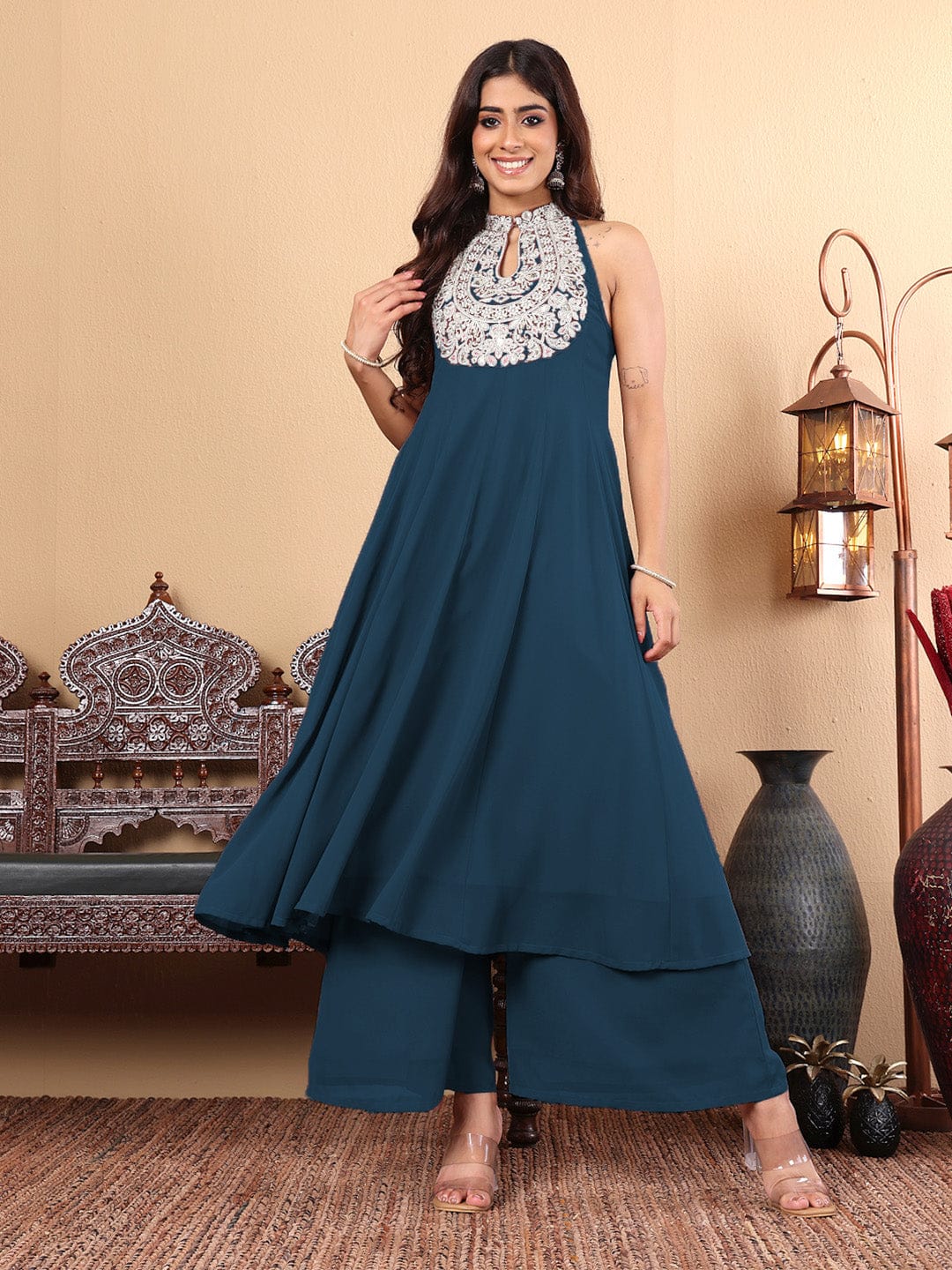 The Kurti Collection Women Nude Yoke Embroidered Sleeveless Flared Kurta With Trousers.