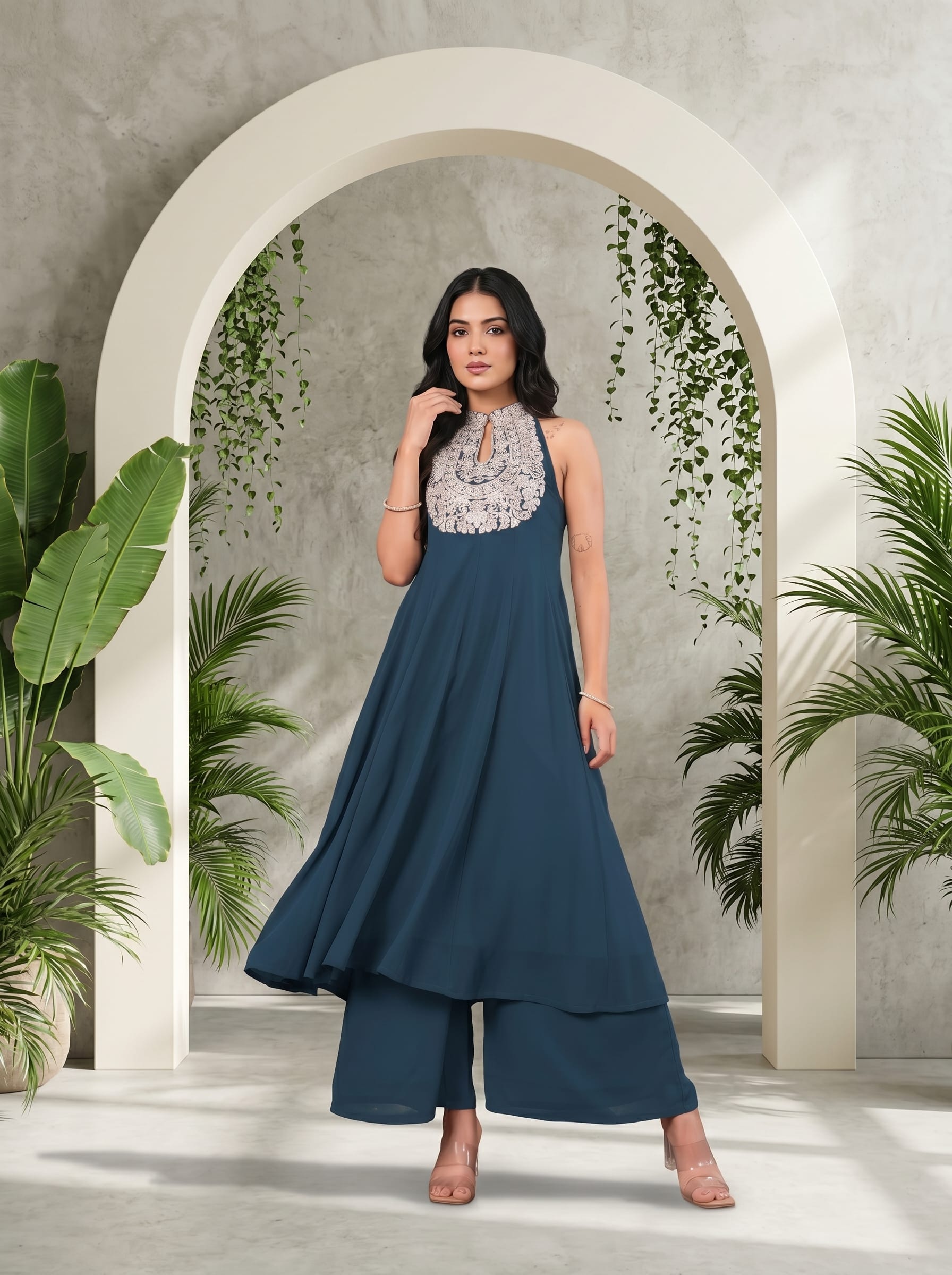 The Kurti Collection Women Blue Yoke Embroidered Sleeveless Flared Kurta With Trousers.
