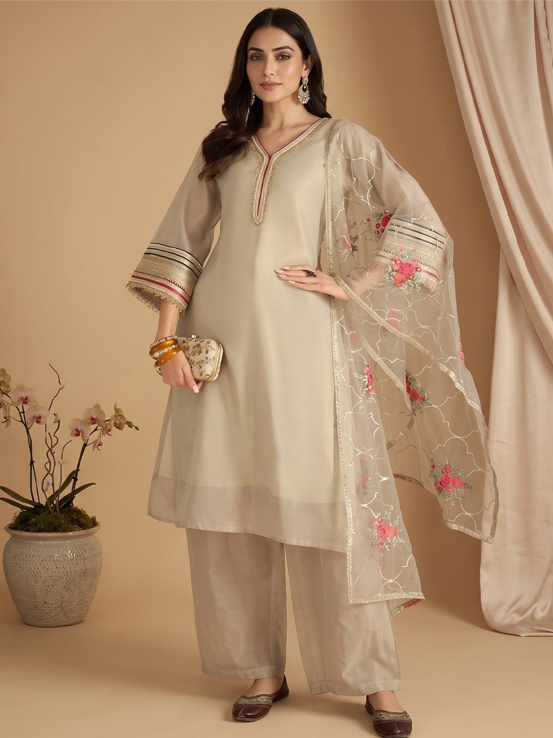 The Kurti Collection Women Three-Piece Set Featuring A Shimmer-Detailed Grey Kurta, Solid Ankle-Length Trousers, And An Embroidered Net Dupatta