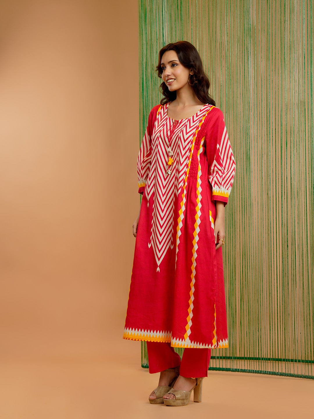 Women's Straight-Fit Red Kurti featuring Geometric Front Panel