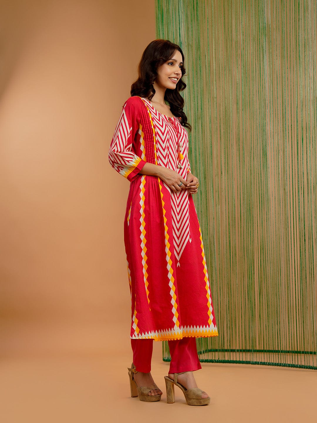 Women's Straight-Fit Red Kurti featuring Geometric Front Panel