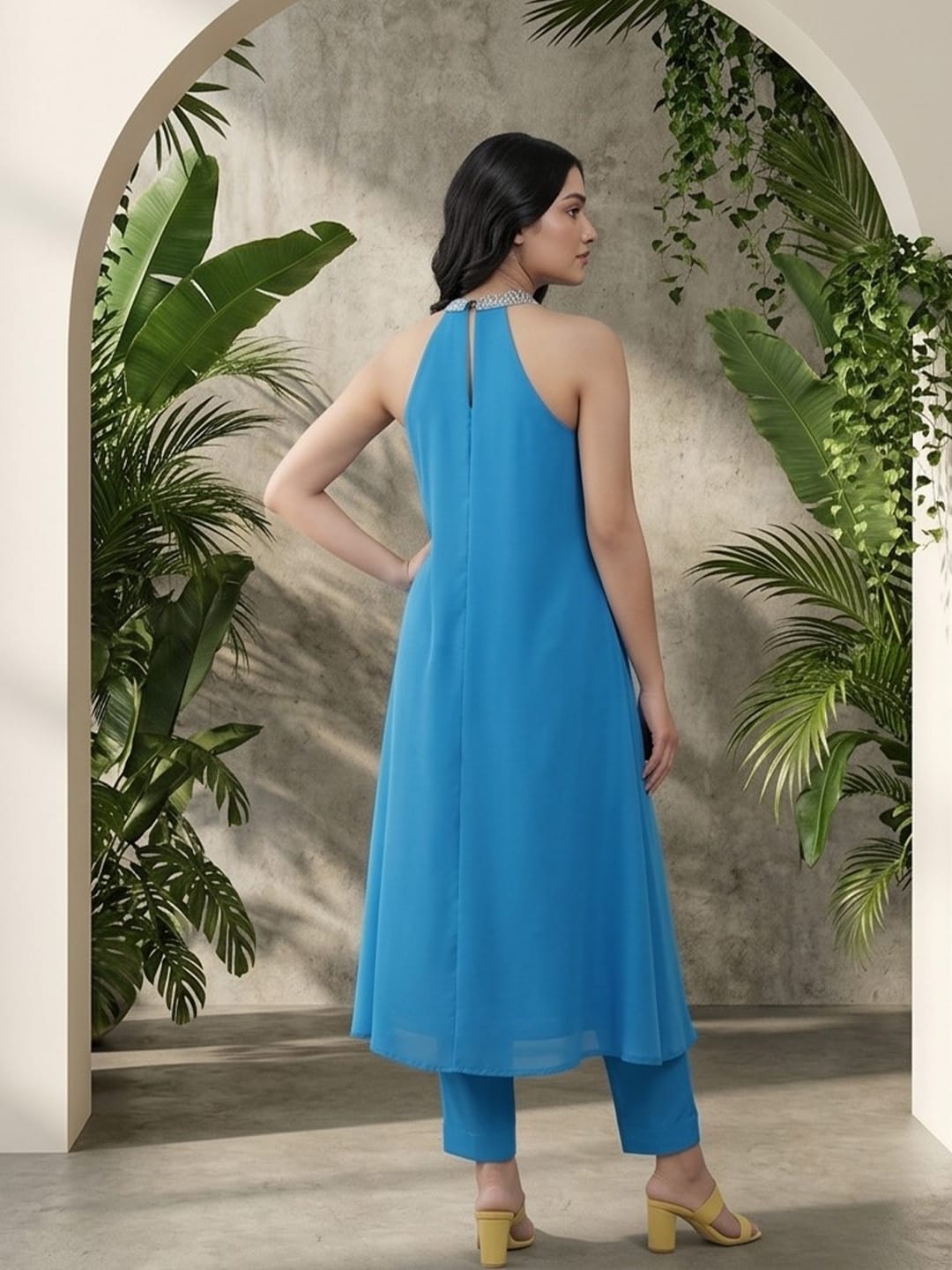 The Kurti Collection Women Halter Neck Blue Sleeveless Flared Kurta Paired With Tonal Bottom