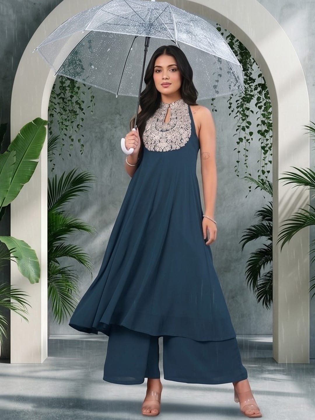 The Kurti Collection Women Blue Yoke Embroidered Sleeveless Flared Kurta With Trousers.