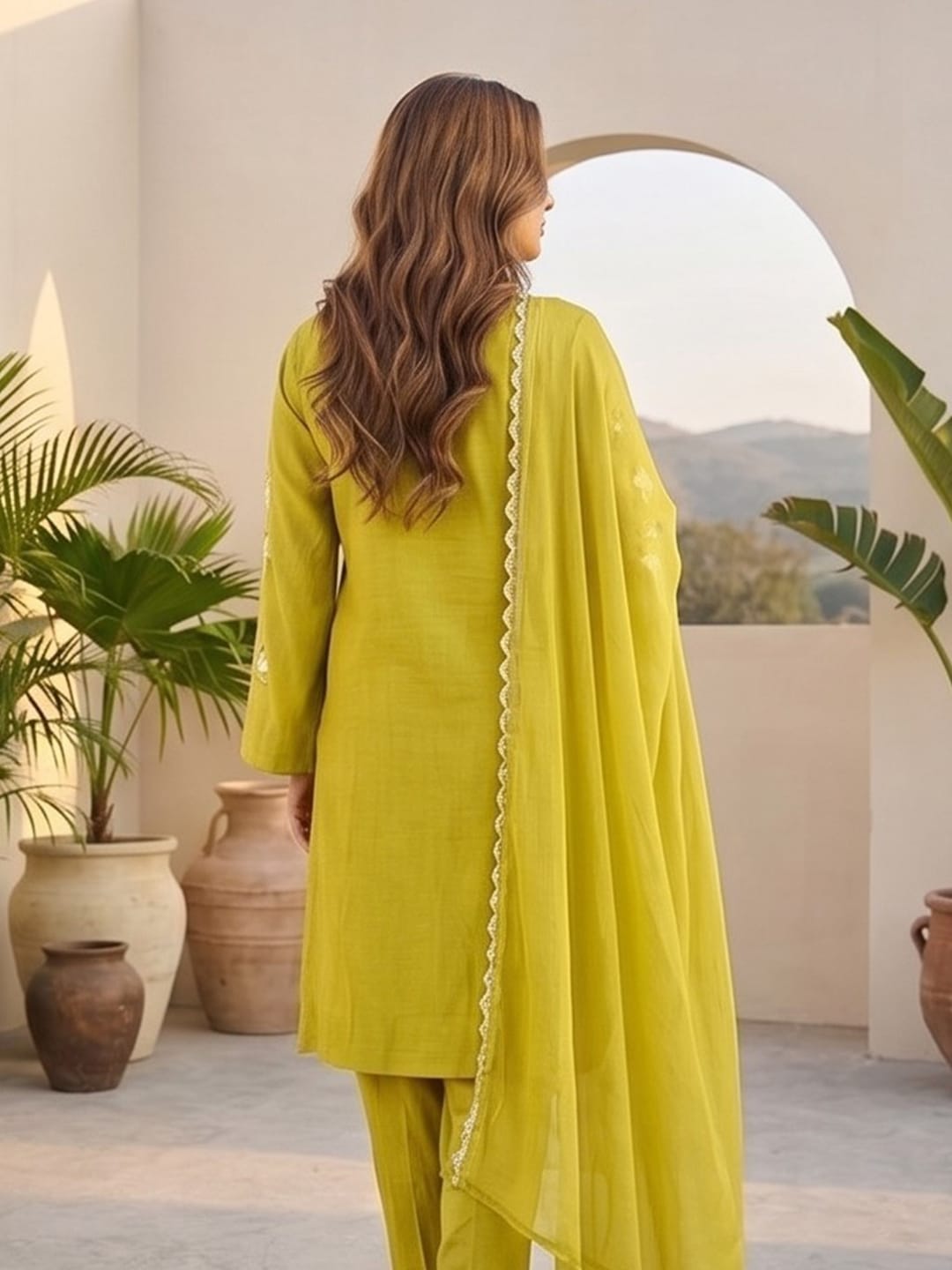 Kurta Set With 3D Work On The Sleeves Paired With Solid Trousers And Dupatta.