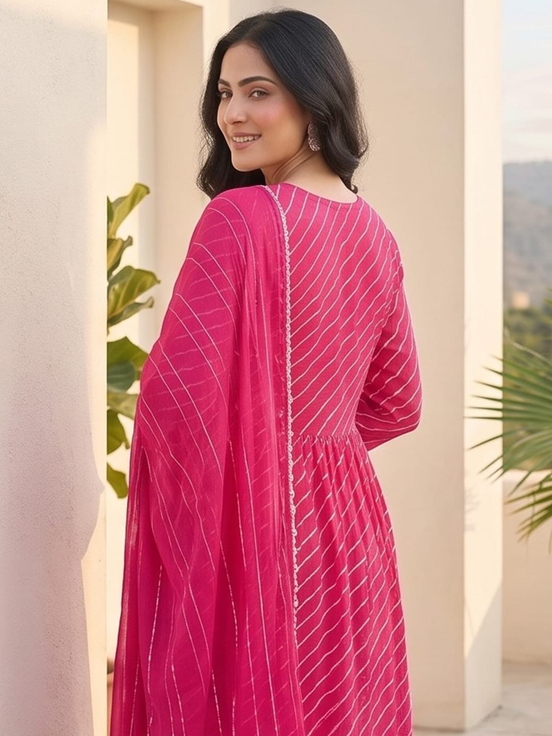 Bandhani-Printed Fuchsia Anarkali With Zari-Embroidered Yoke, Paired With Solid Trousers And Dupatta .