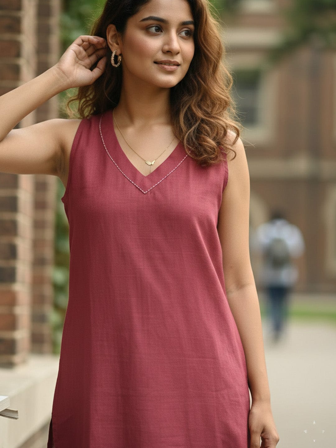 The Kurti Collection Sleeveless Solid Kurta with V-Neck and Subtle Floral Embroidery