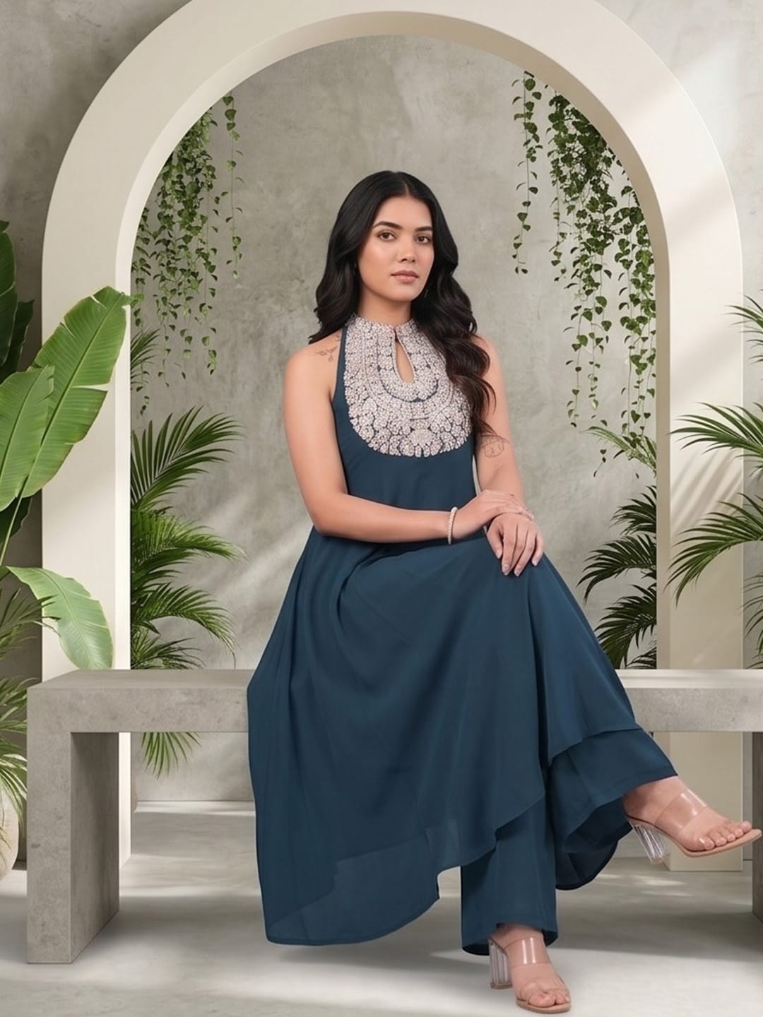 The Kurti Collection Women Blue Yoke Embroidered Sleeveless Flared Kurta With Trousers.