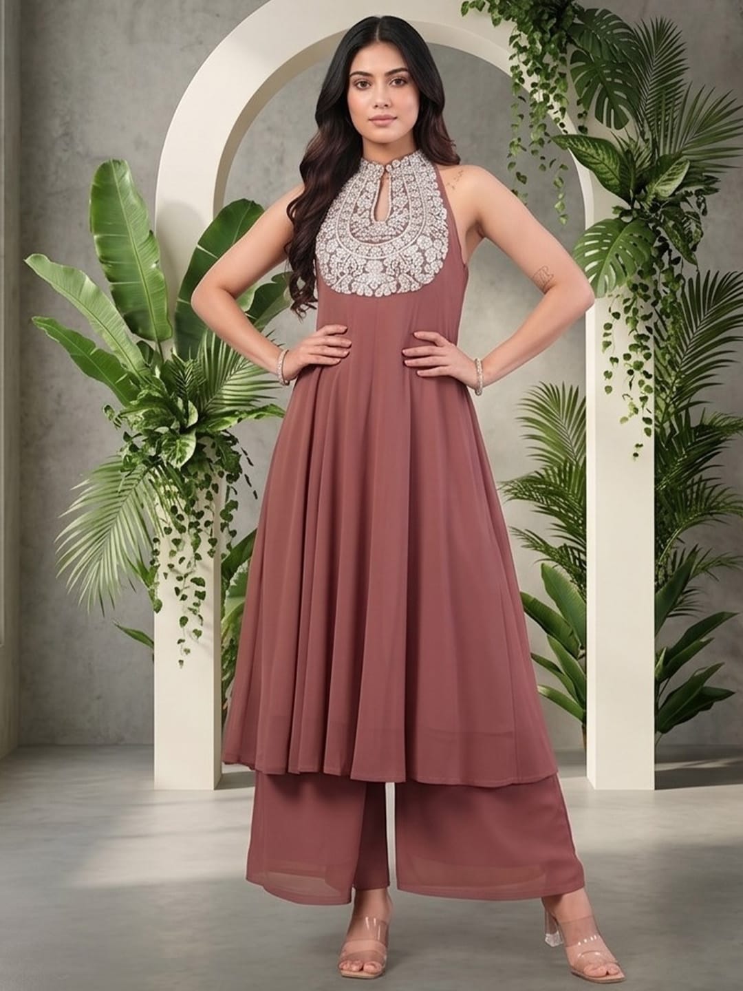 The Kurti Collection Women Nude Yoke Embroidered Sleeveless Flared Kurta With Trousers.