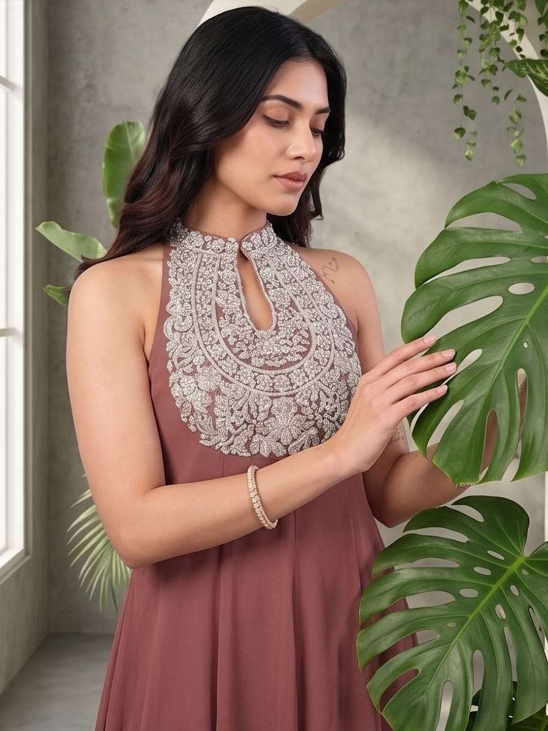 The Kurti Collection Women Nude Yoke Embroidered Sleeveless Flared Kurta With Trousers.