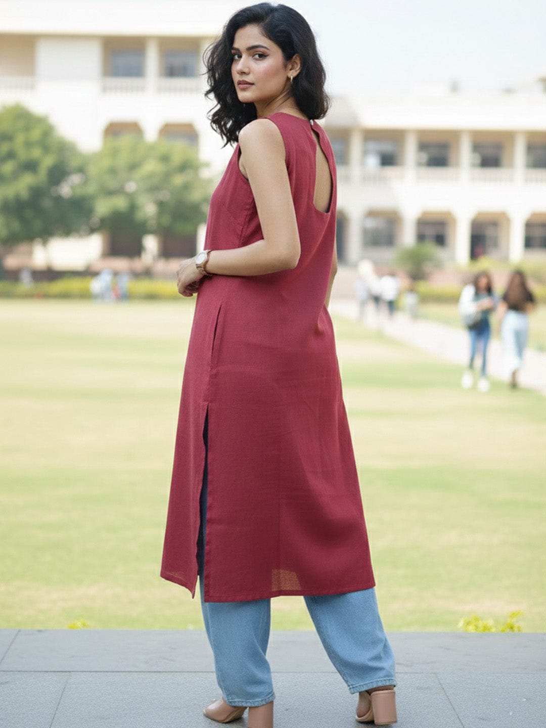 The Kurti Collection Sleeveless Solid Kurta with V-Neck and Subtle Floral Embroidery