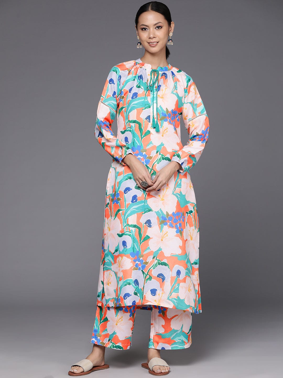 KSUT Women Orange Floral Printed Straight Kurta Paired With Printed Bottom