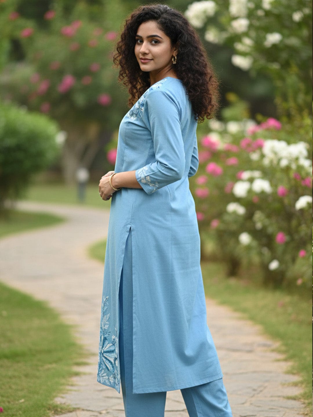 The Kurti Collection women's ethnic solid skyblue round neck with v notch A line kurta with elegant emb. and 3/4 sleeves.