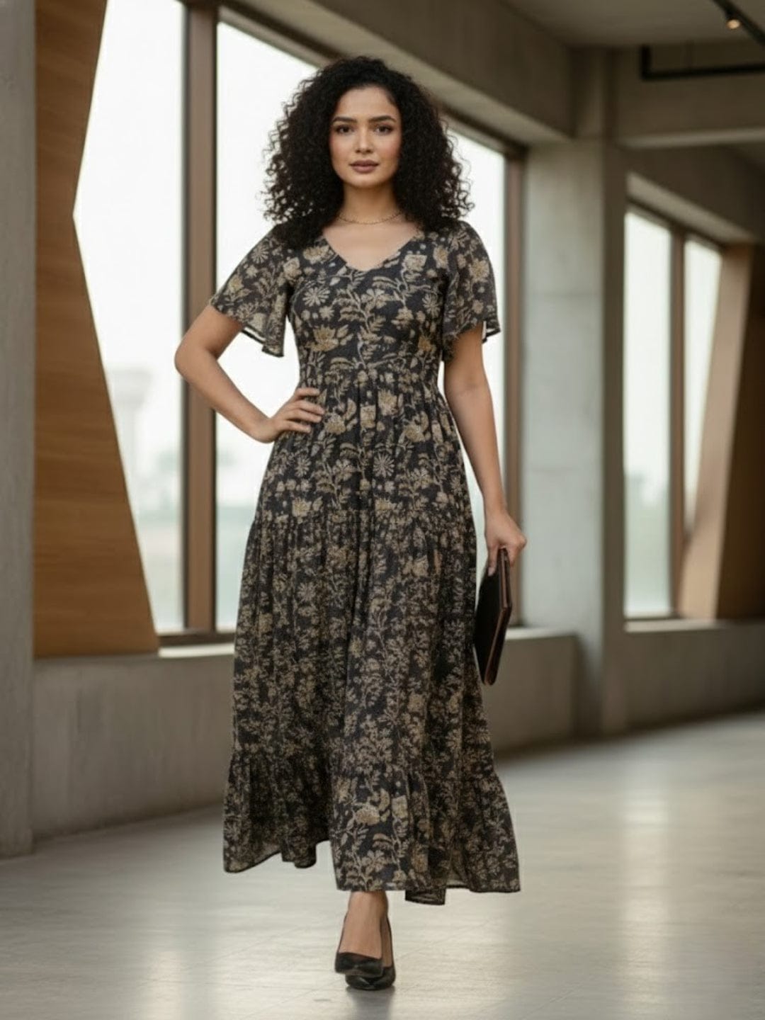 The Kurti Collection Women's Ethnic Floral Printed Brown Flared Dress featuring a V-Neck and Flared Sleeves.