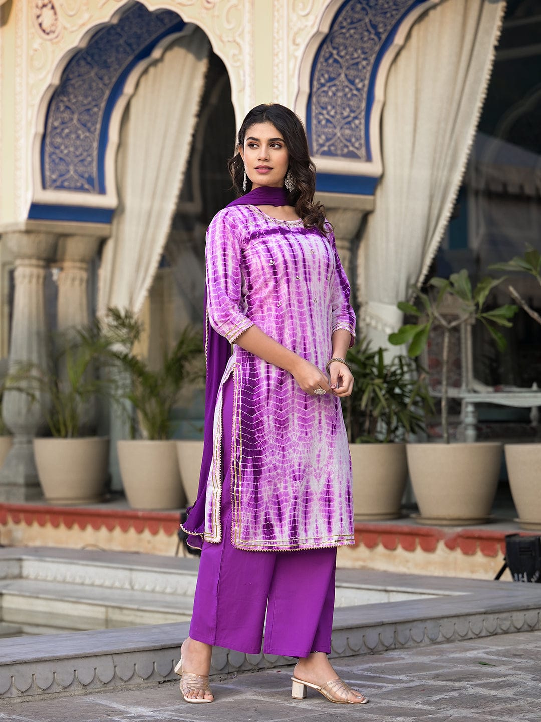 The Kurti Collection straight kurta with round neck paired with blue solid palazzo and blue solid dupatta.