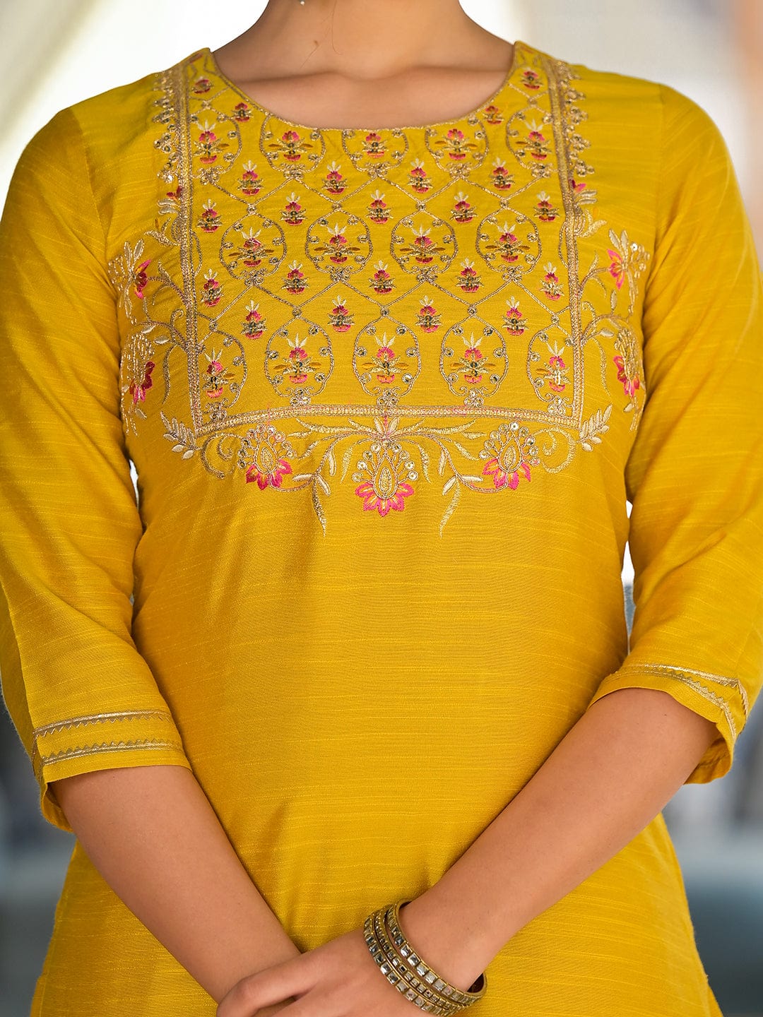 The Kurti Collection yellow yoke embroidered kurta paired with tonal bottom and lehariya dupatta