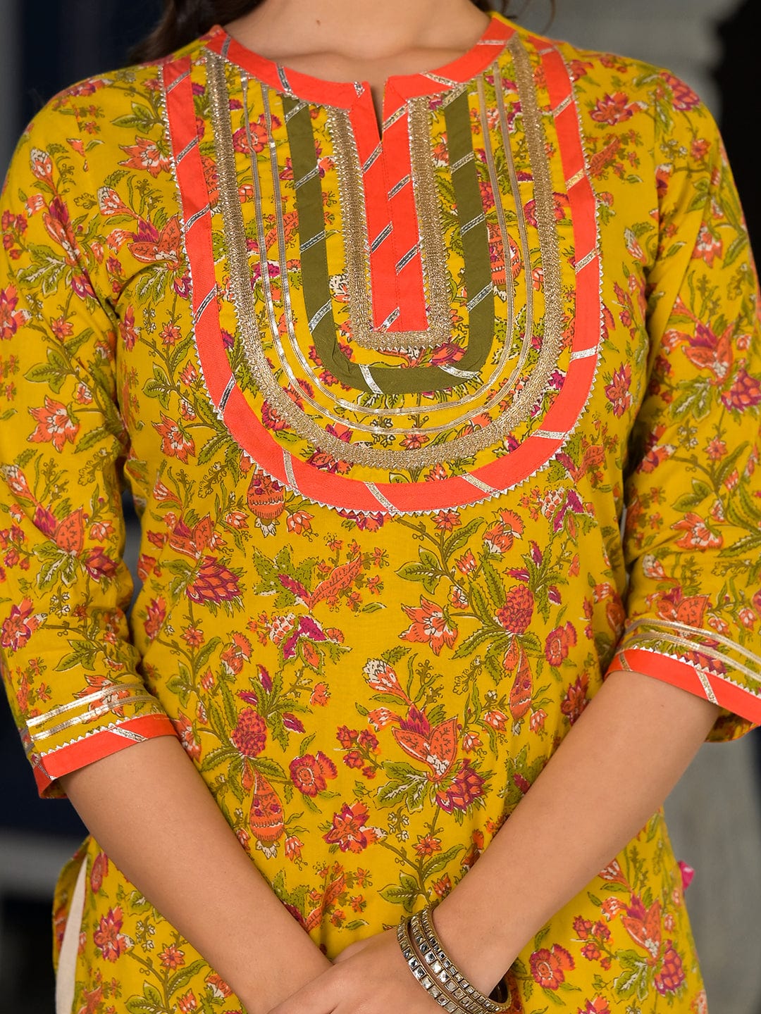 The Kurti Collection Yellow And Peach Straight Floral Printed Kurta With Round Neck And Having Gota Work On Yoke