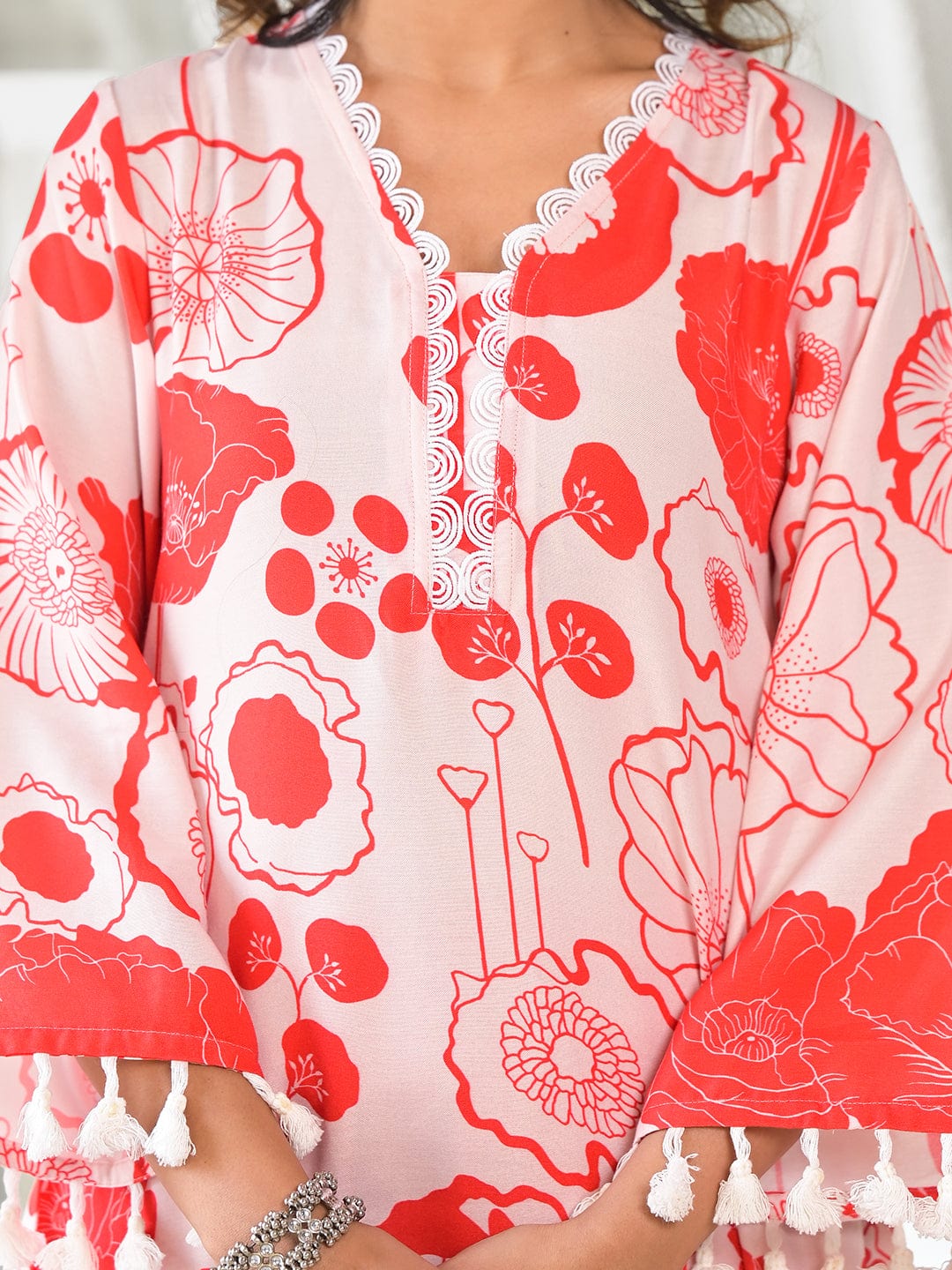 The Kurti Collection Women Peach Floral Printed V-Neck Straight Kurta With Tessels Hem Paired With Tonal Solid Bottom