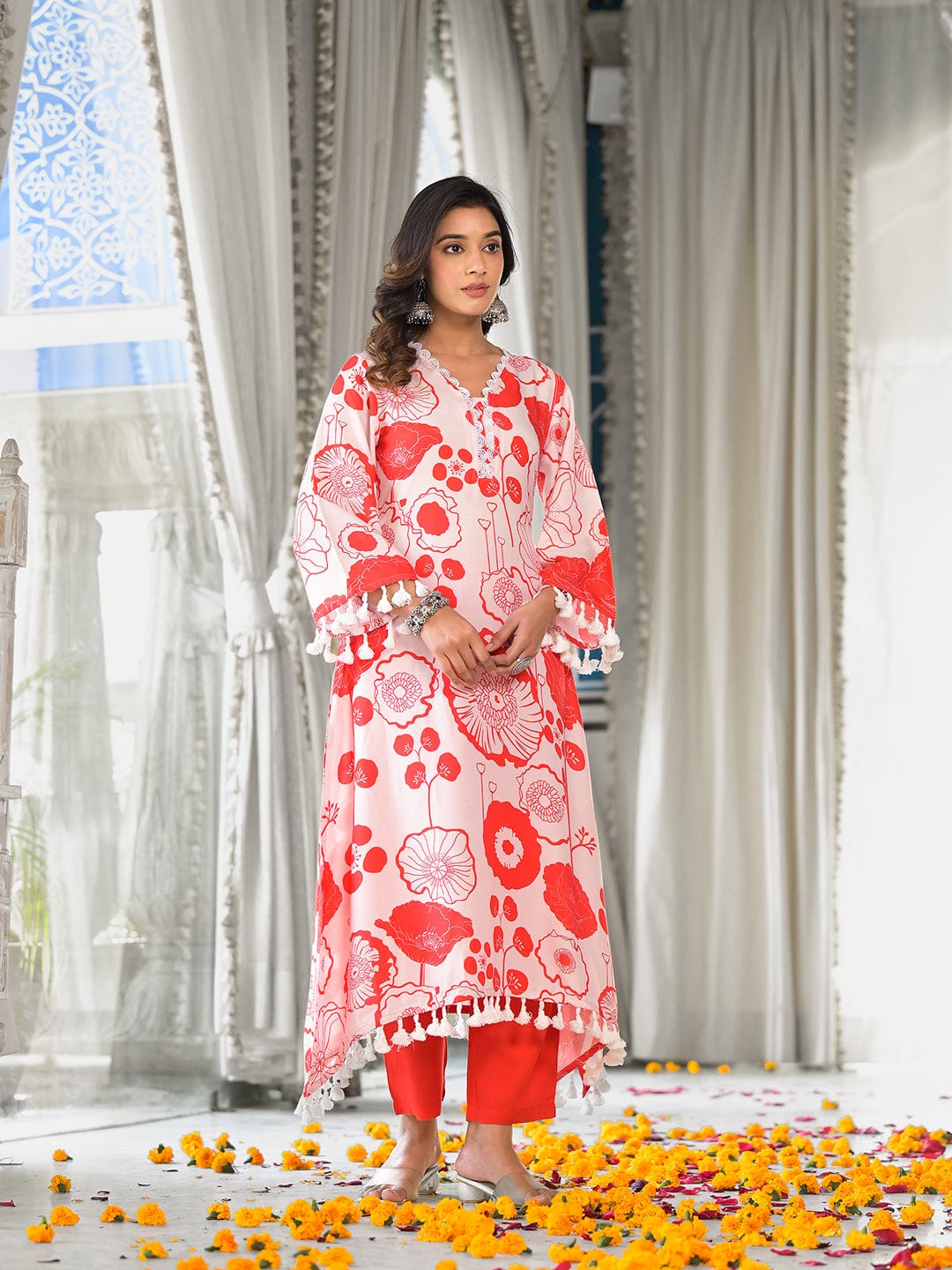 The Kurti Collection Women Peach Floral Printed V-Neck Straight Kurta With Tessels Hem Paired With Tonal Solid Bottom