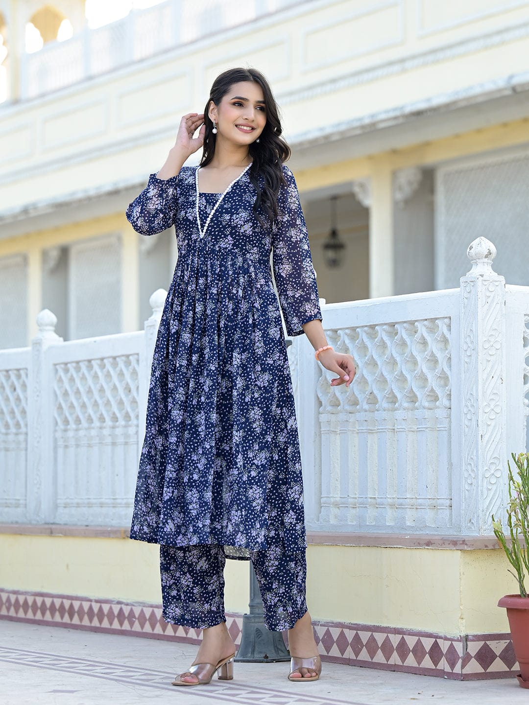The Kurti Collection Women Navy Blue All over Floral Printed Pleated Empire Kurta Paired With Tonal Bottom