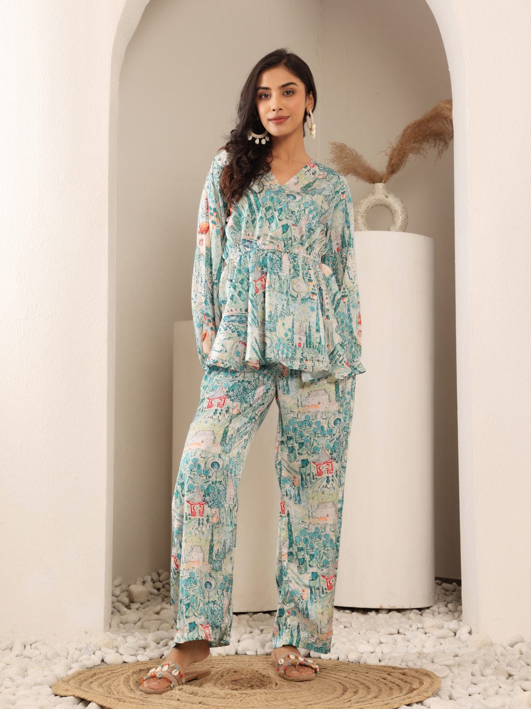 The Kurti Collection Women White & Teal Abstract Printed Peplum Top Paired With Straight Printed Bottom.