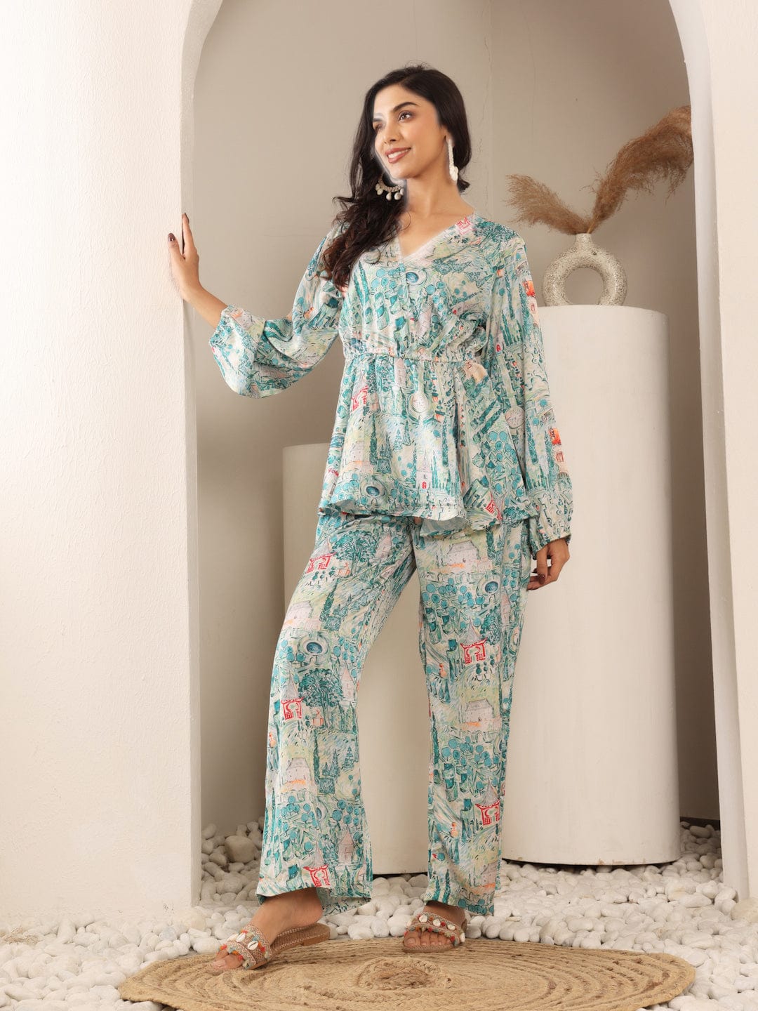 The Kurti Collection Women White & Teal Abstract Printed Peplum Top Paired With Straight Printed Bottom.