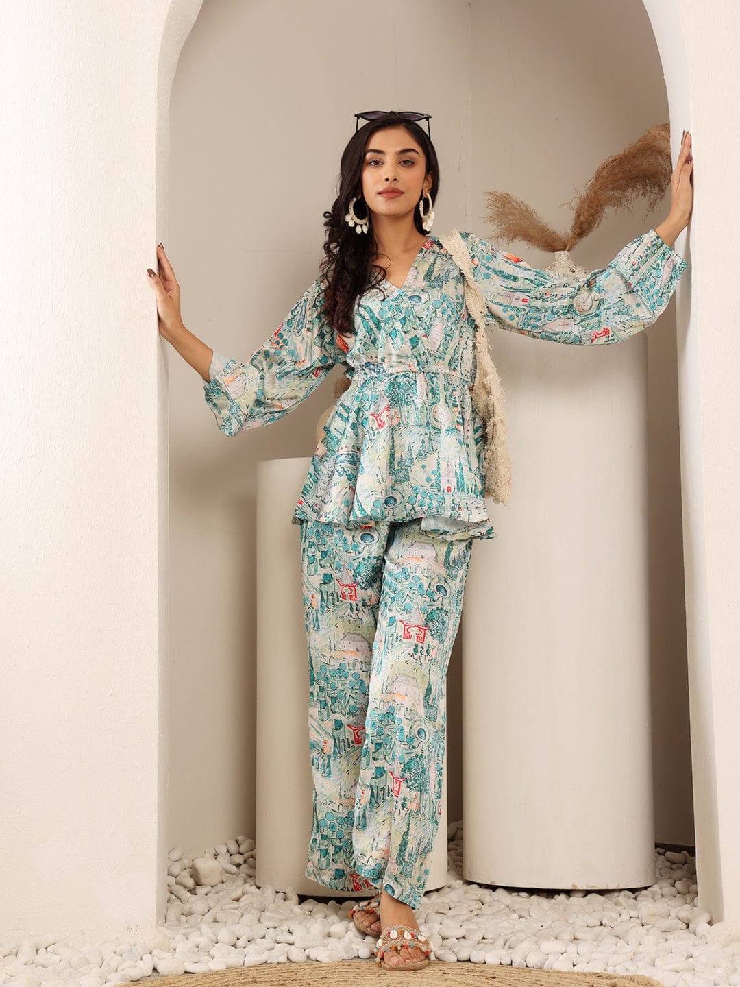 The Kurti Collection Women White & Teal Abstract Printed Peplum Top Paired With Straight Printed Bottom.