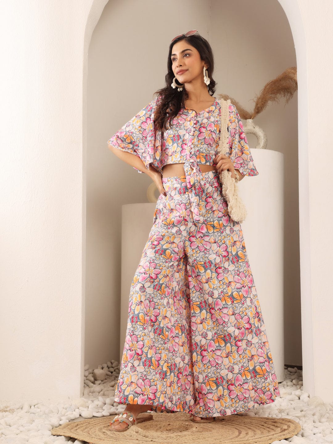 The Kurti Collection Women Grey Floral Printed Crop Top With Flared Sleeves, Front Open Tie Up Details Paired With Flared Bottom.