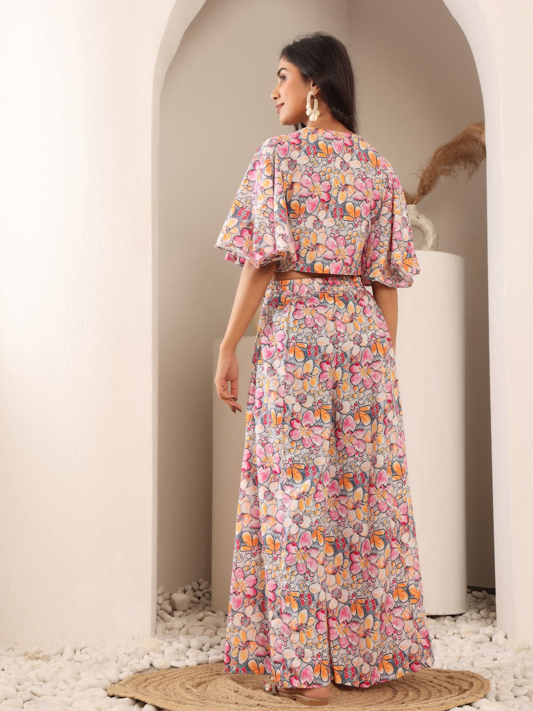 The Kurti Collection Women Grey Floral Printed Crop Top With Flared Sleeves, Front Open Tie Up Details Paired With Flared Bottom.