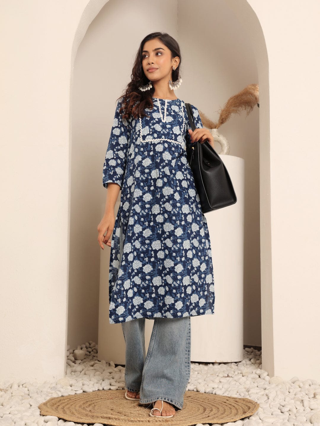 The Kurti Collection Women Blue Floral Jaal Printed Straight Kurta With Side Slit.