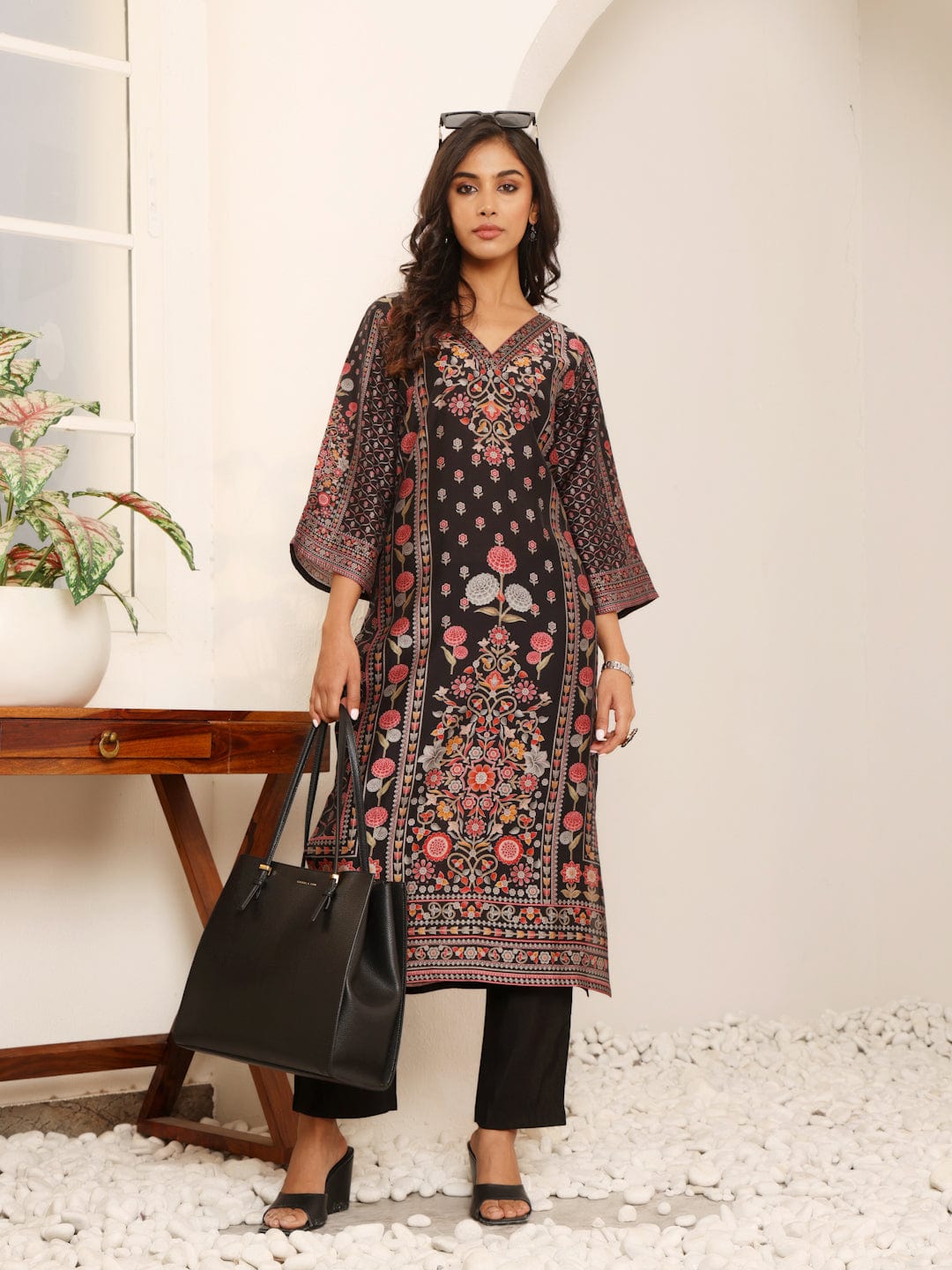 The Kurti Collection Women Black Ethnic Floral Printed Kurta With Solid Trouser.