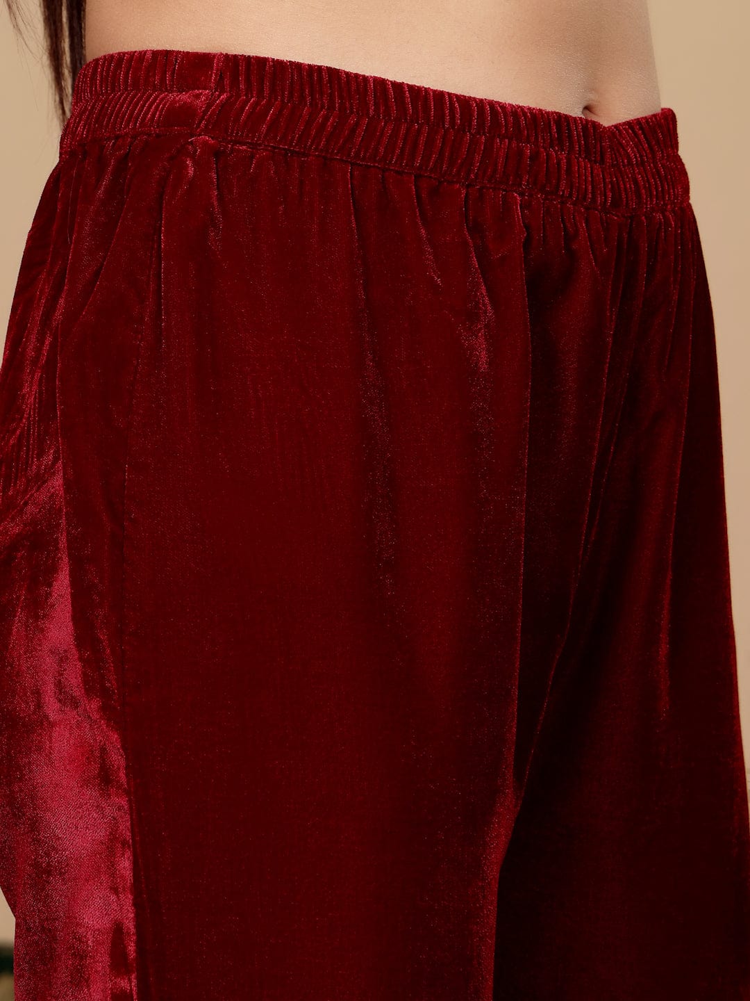 The Kurti Collection Women Maroon Velvet Thread Embroidered Straight Kurta With Trousers And Fringed Velvet Dupatta.