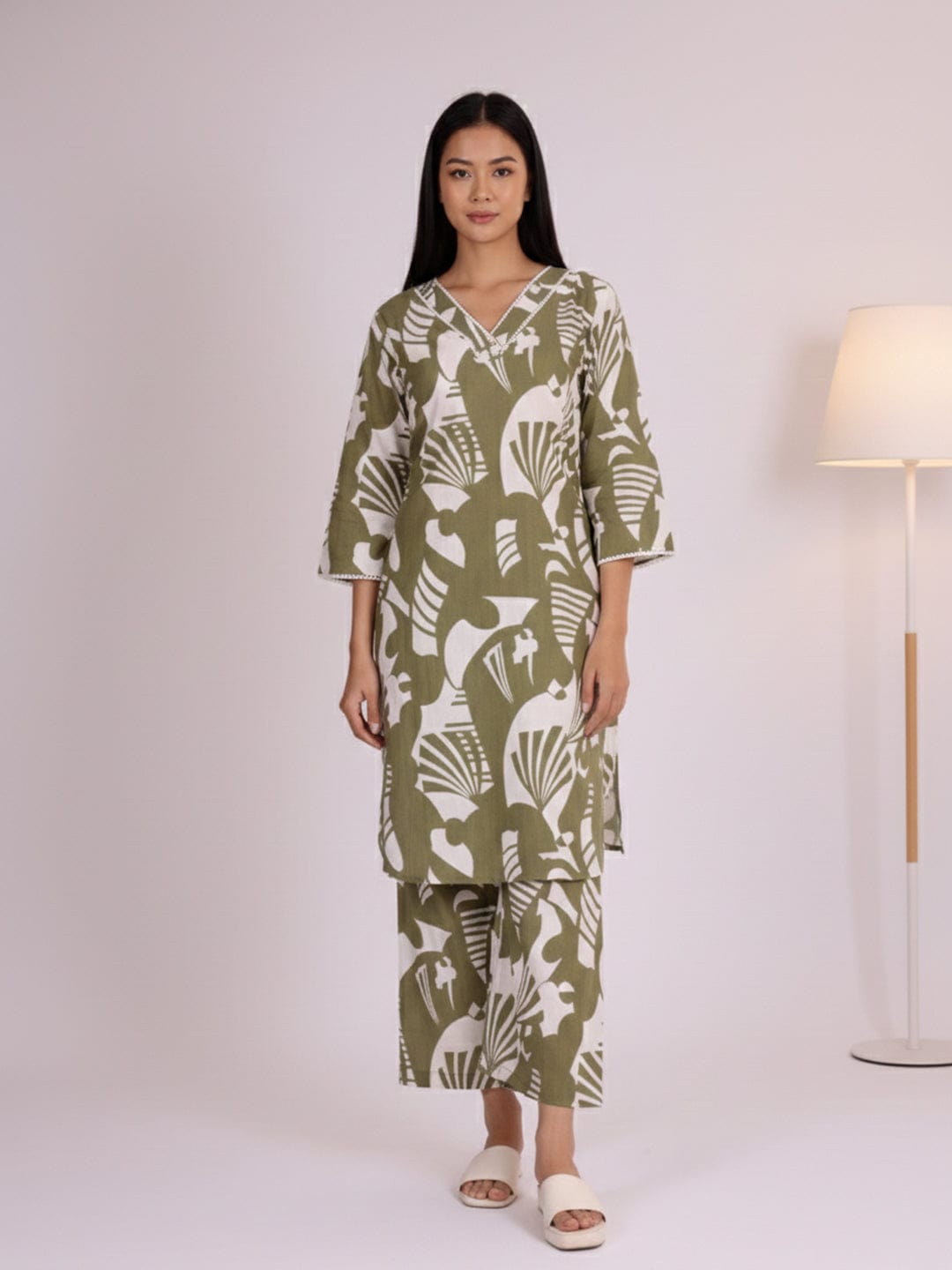KSUT Women Bold Abstract Printed V Neck Flared Sleeve Kurta With Trouser