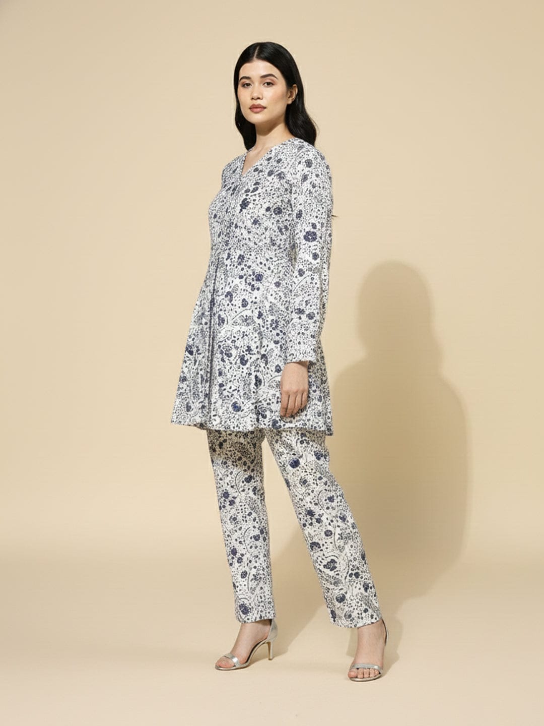 KSUT Women white floral printed top paired with tonal printed bottom