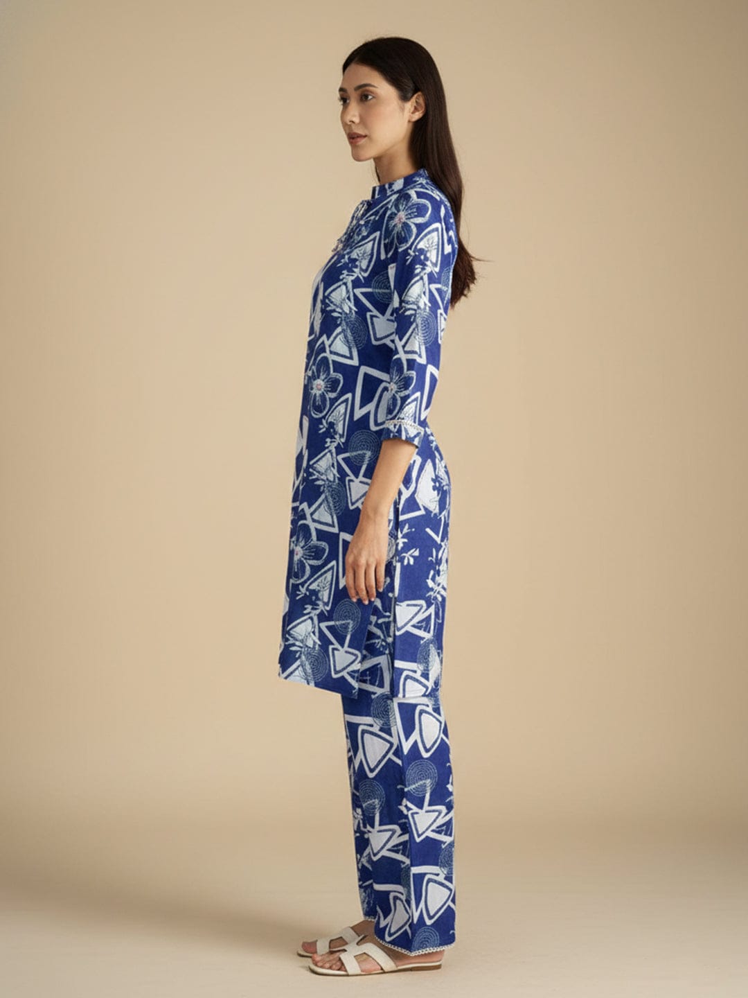 Blue and white printed straight kurta with a mandarin collar, paired with solid straight-fit trousers perfect for everyday elegance and comfort.