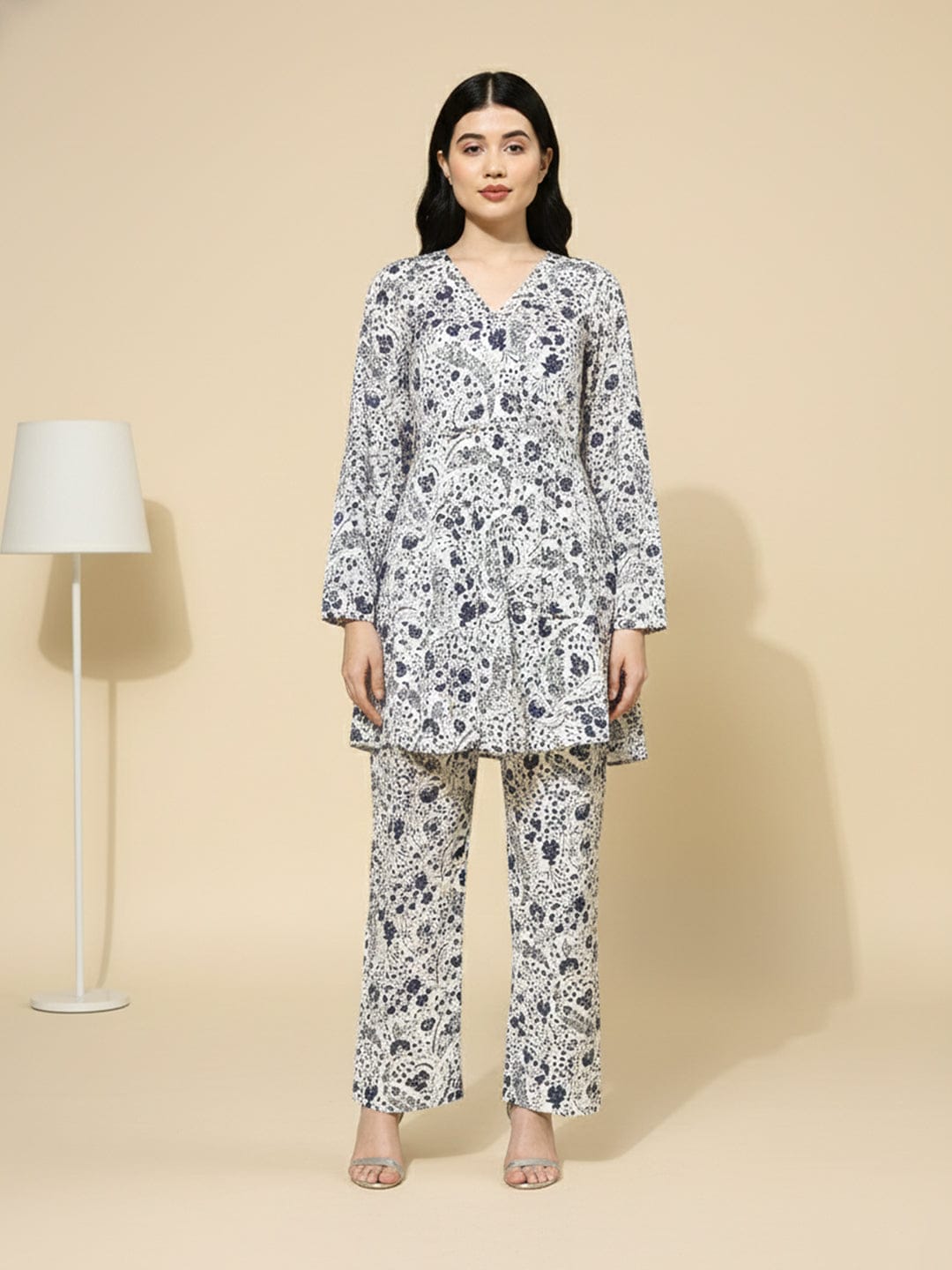 KSUT Women white floral printed top paired with tonal printed bottom