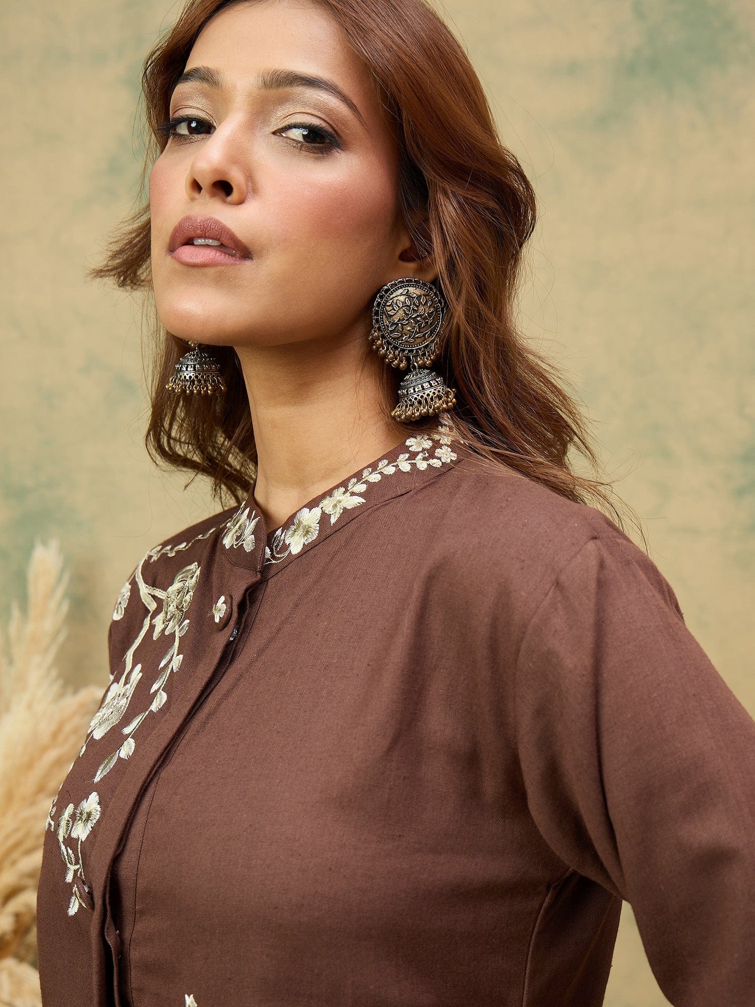 KSUT Women Elegant Brown Co-Ord Set Featuring Thread Embroidery , Paired With Ankle-Length Trousers For A Chic, Coordinated Look.