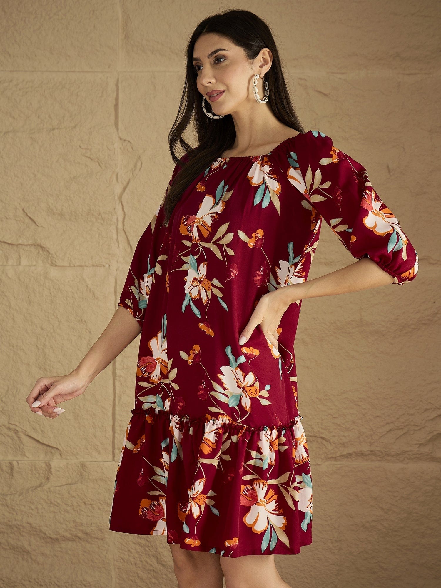 A Bold Floral-Printed Knee-Length Dress With An Elasticated Off-Shoulder Neckline And Balloon Sleeves Perfect For Turning Heads From Brunch To Evening Outings.