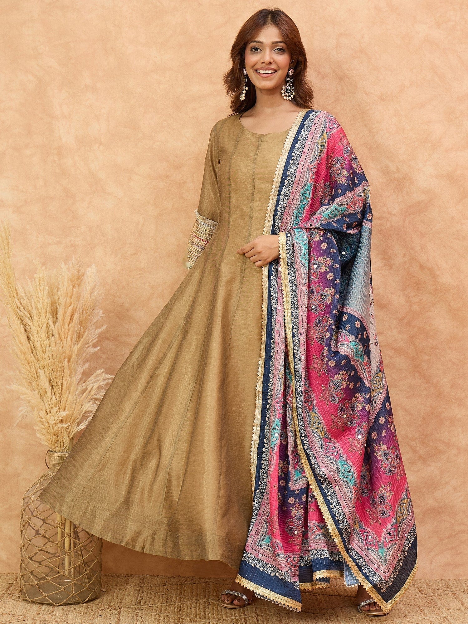 The Kurti Collection Women Shimmer Anarkali Featuring Lace-Detailed Sleeves And A Tasseled Dori at The Back Neck, Paired With a Printed Dupatta Embellished With Mirror .