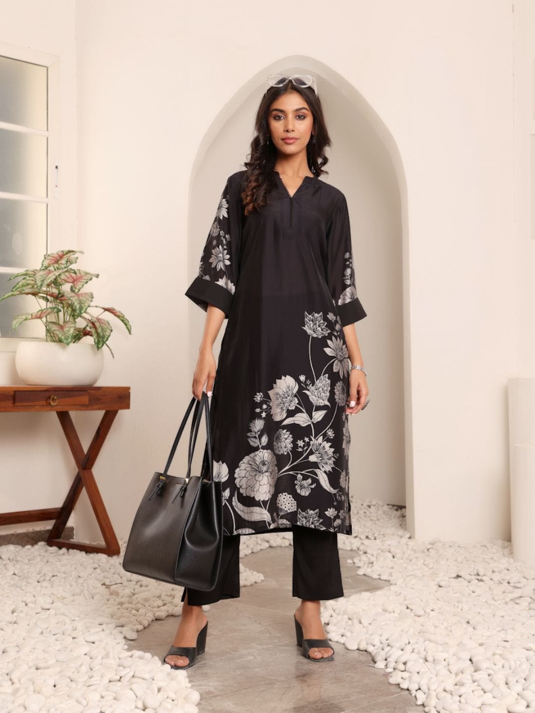 The Kurti Collection Women Black Floral Printed Kurta With Solid Trouser.