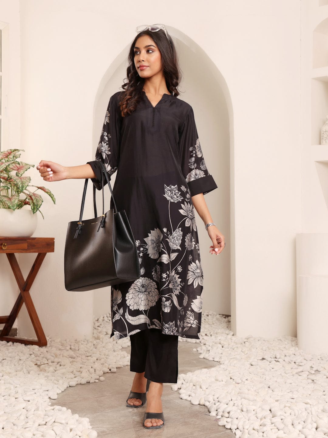 The Kurti Collection Women Black Floral Printed Kurta With Solid Trouser.
