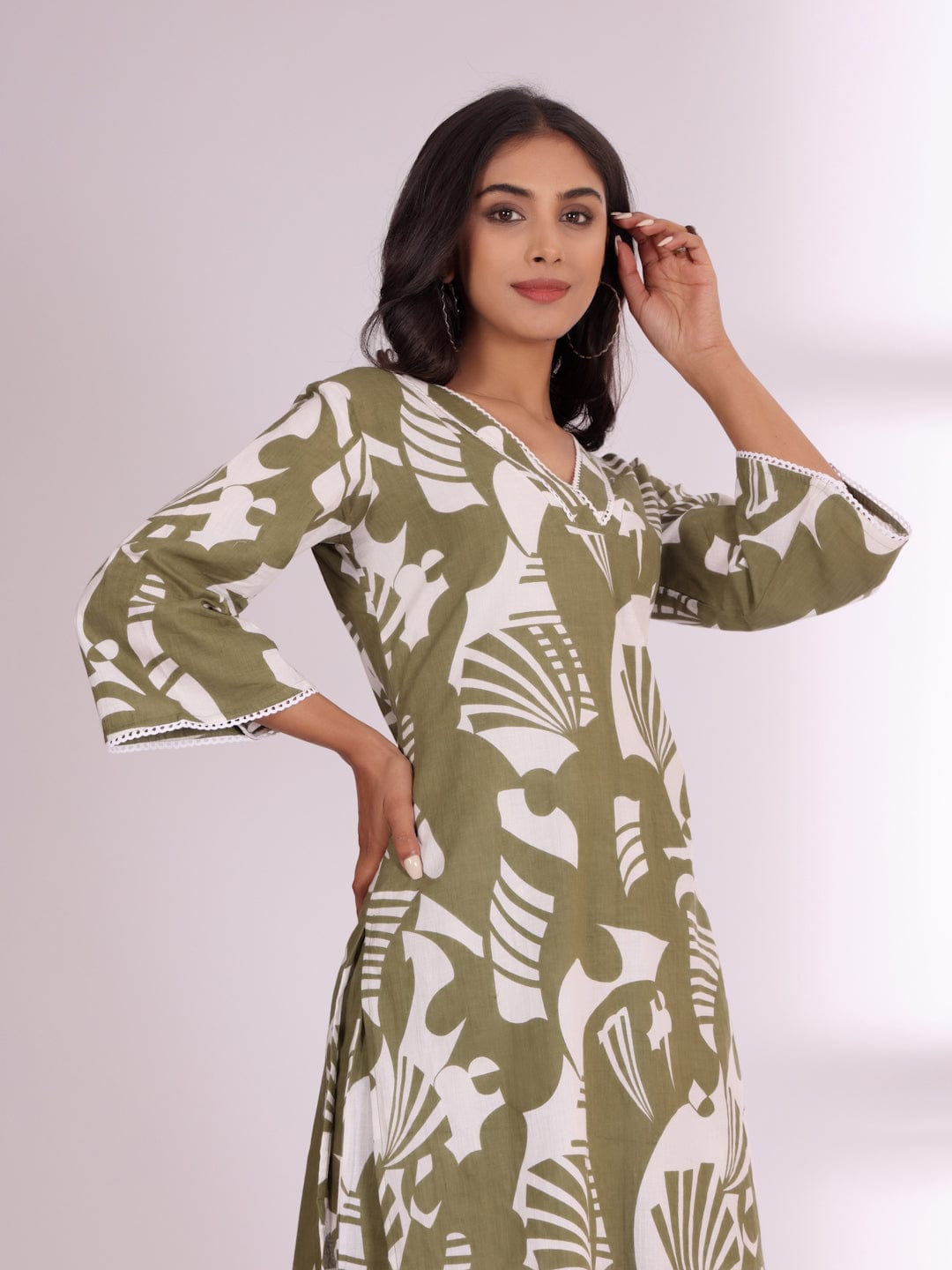 KSUT Women Bold Abstract Printed V Neck Flared Sleeve Kurta With Trouser