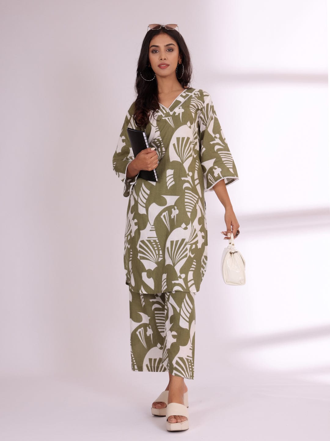 KSUT Women Bold Abstract Printed V Neck Flared Sleeve Kurta With Trouser