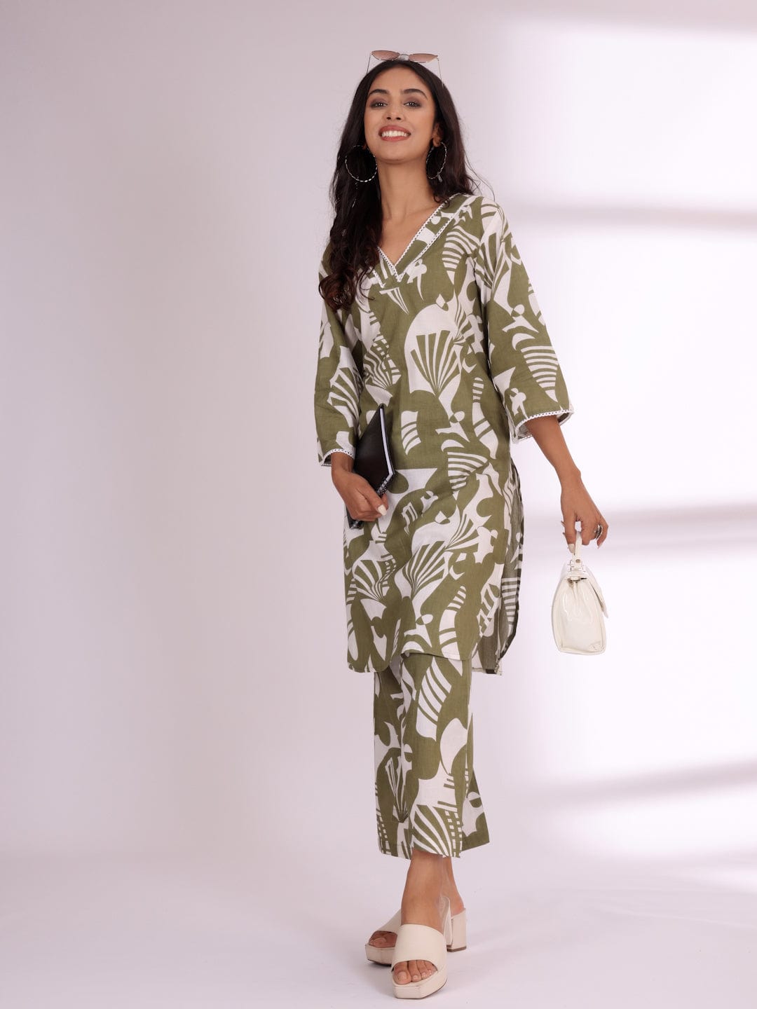 KSUT Women Bold Abstract Printed V Neck Flared Sleeve Kurta With Trouser
