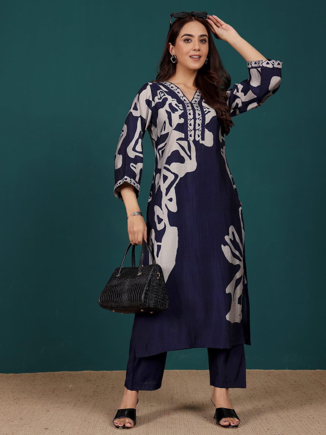 The Kurti Collection Women Abstract Printed V Neck Flared Sleeve Kurta With Trouser