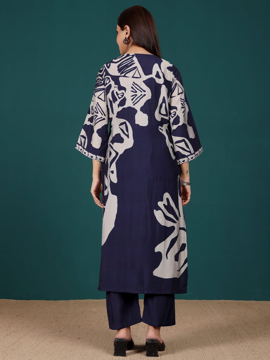 The Kurti Collection Women Abstract Printed V Neck Flared Sleeve Kurta With Trouser