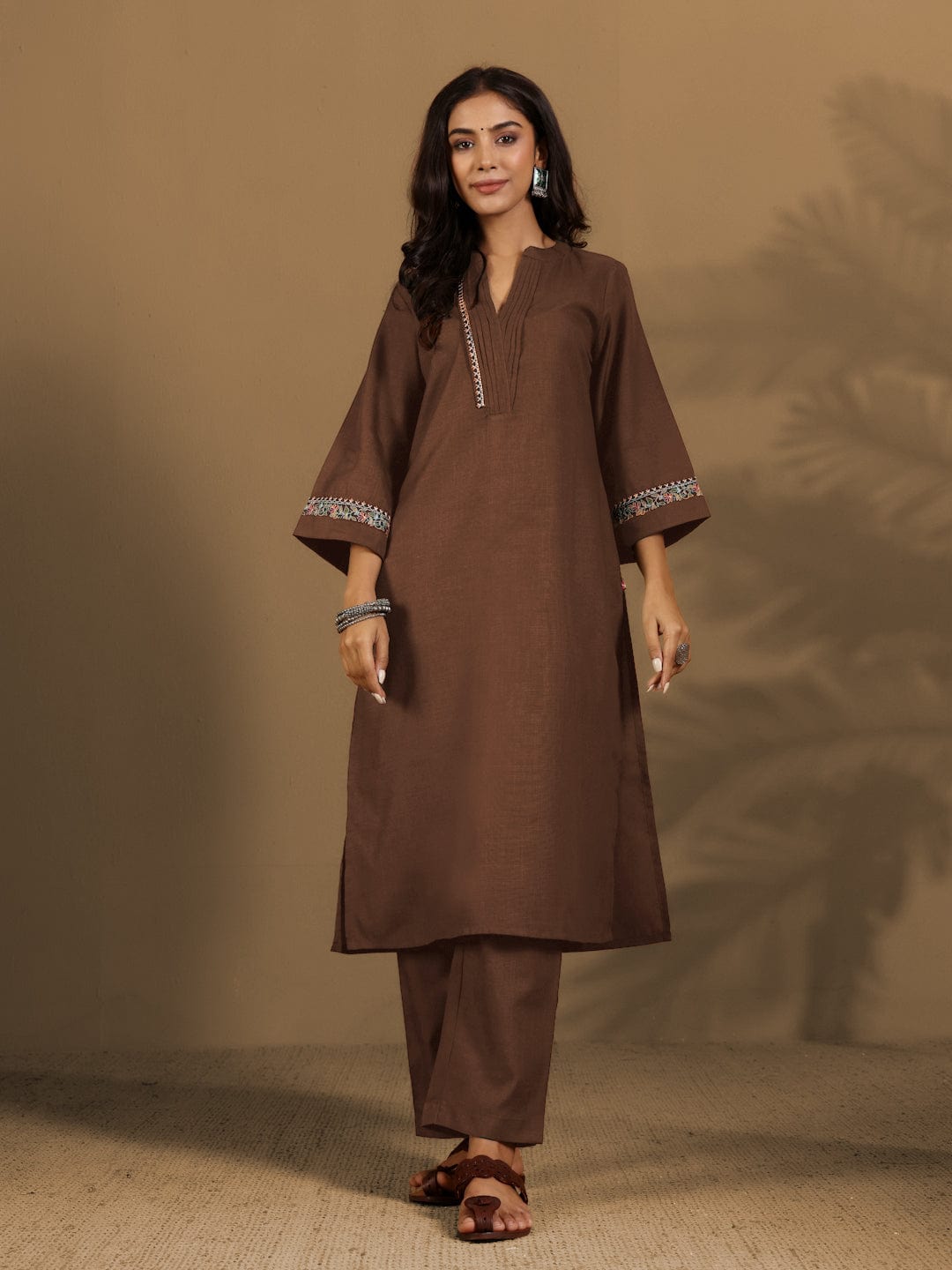 The Kurti Collection Women Brown Mandarin Collar Thread Embroidered With Pleate Deatialing Kurta Paired With Bottom