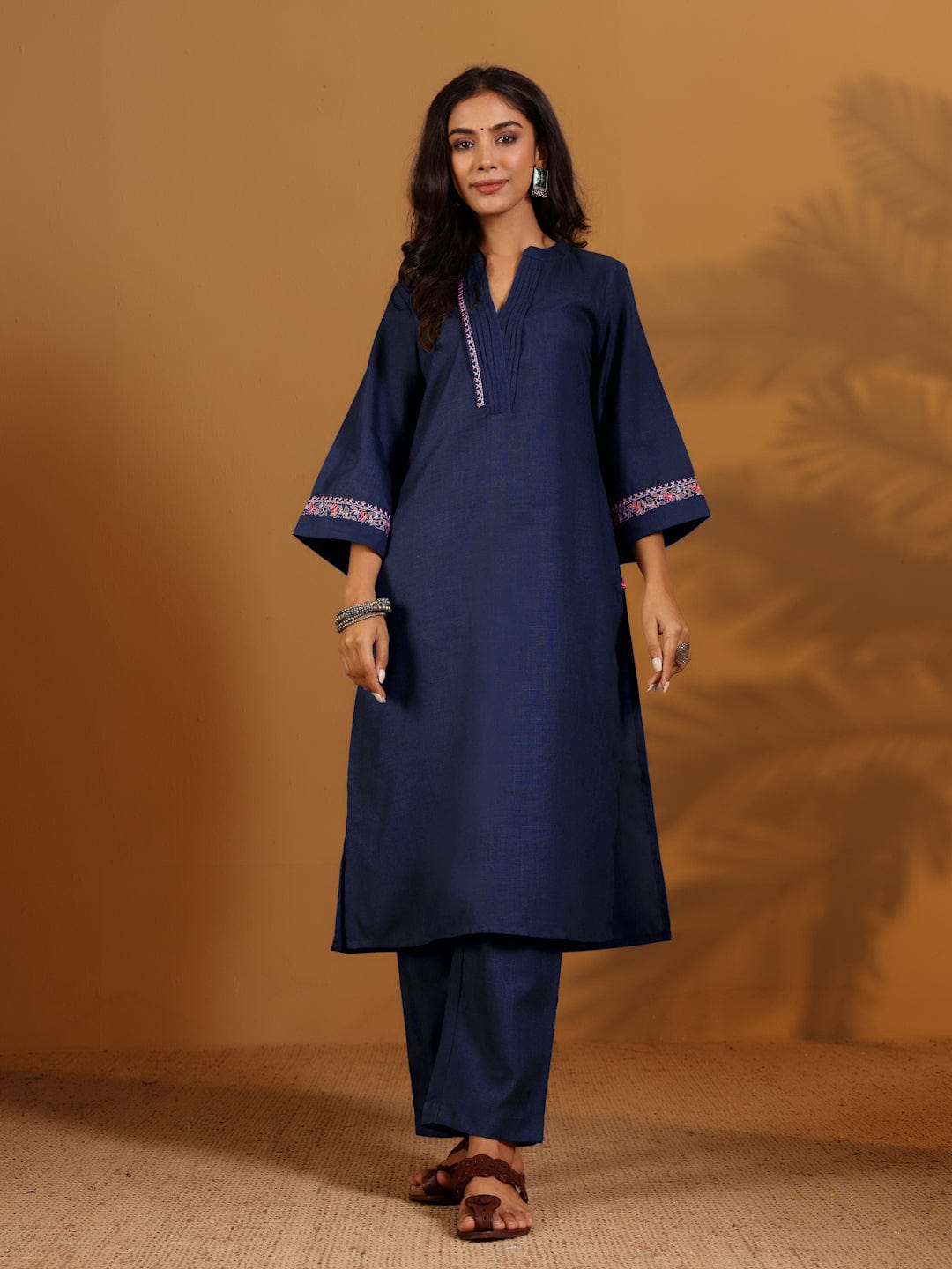 The Kurti Collection Women Blue Mandarin Collar Thread Embroidered With Pleate Deatialing Kurta Paired With Bottom