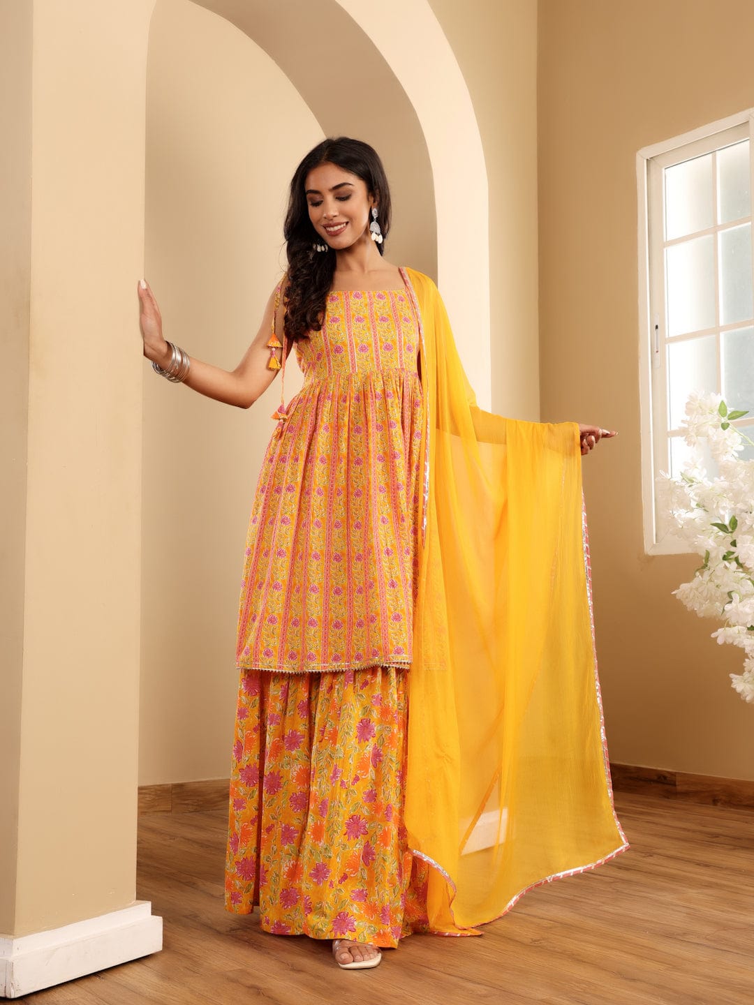 The Kurti Collection Women Floral Printed Strappy Flared Kurta With Sharara & Dupatta