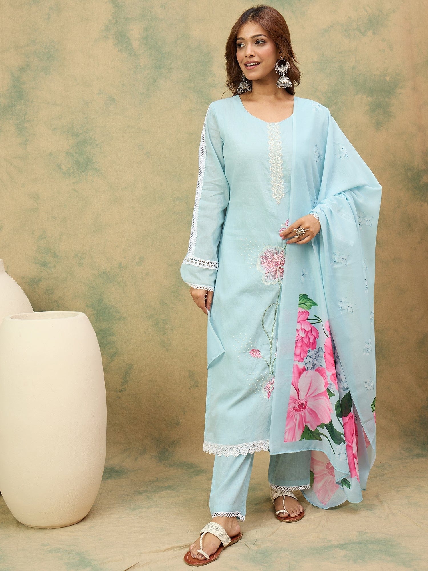 The Kurti Collection Women A Graceful 3-Piece Set Featuring A Sky Blue Straight-Fit Kurta With Bell Sleeves, Solid Ankle-Length Trousers, And A Floral Printed Dupatta For A Timeless Ethnic Look.