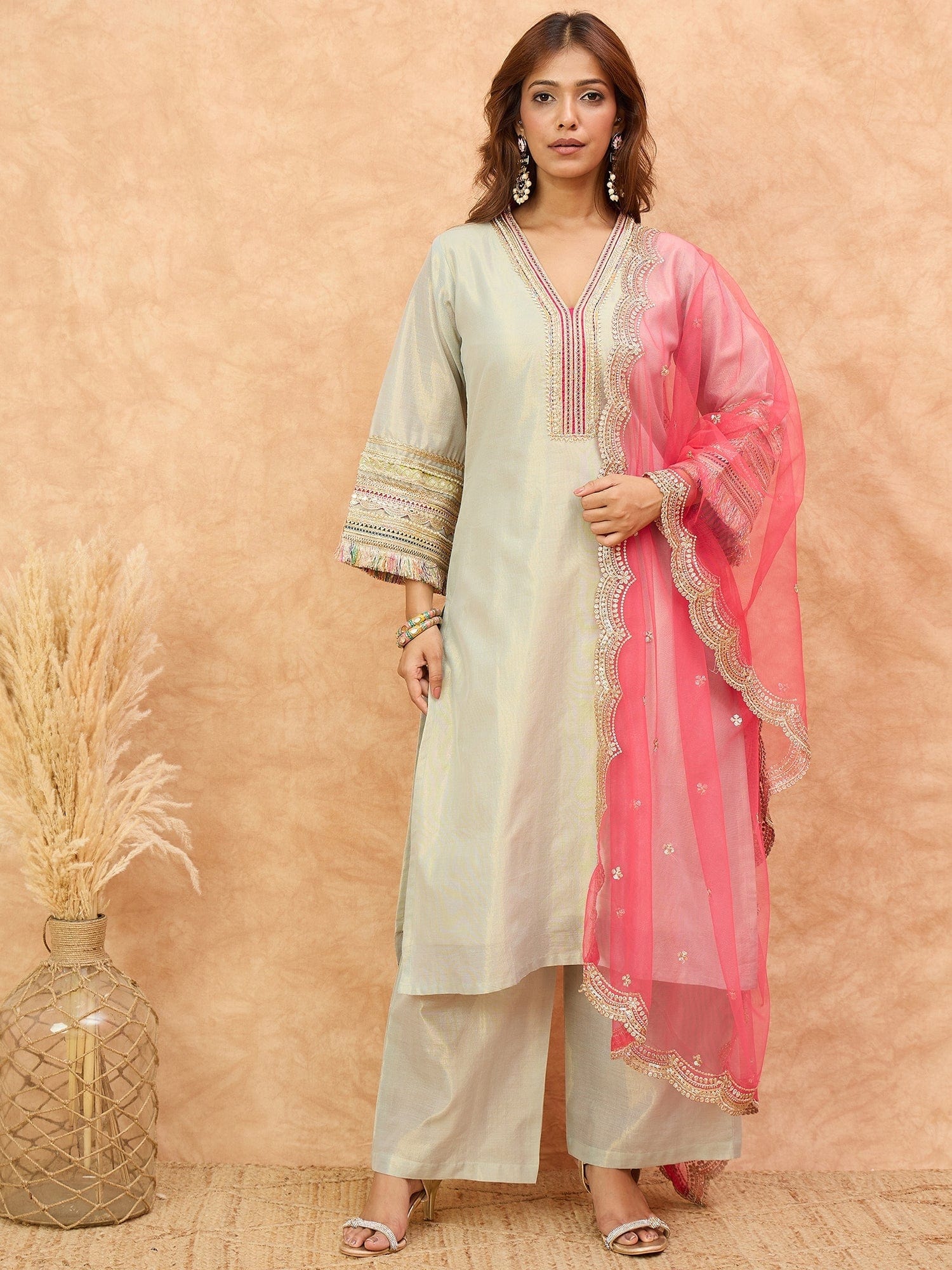 The Kurti Collection Women Shimmer Kurta Set Adorned With Delicate Zari Lace Detailing Paired With Net Dupatta.